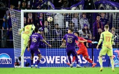 Andres Reyes heads in the winner as the New York Red Bulls beat Orlando City to reach the MLS Cup final.