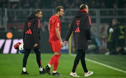 Bayern Munich's English forward Harry Kane (C) suffered a hamstring injury during Saturday's 1-1 Bundesliga draw at Borussia Dortmund