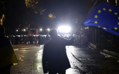 Georgian protesters accuse the government of steering Tbilisi away from its goal of joining the EU