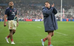 Peato Mauvaka (L) and Antoine Dupont (R) celebrate France's win over Japan in November