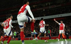 Arsenal celebrate Jurrien Timber's goal against Manchester United