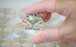 The coin's design includes the psychedelic 'magic piano' featured in the 1967 Magical Mystery Tour film