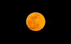 A supermoon rises over Singapore on October 17, 2024