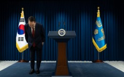 South Korean President Yoon Suk Yeol bows after apologising for his declaration of martial law in a nationally televised speech