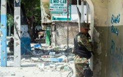 Police forces take part in an operation against powerful gangs in the city center near the National Palace in Port-au-Prince on July 9, 2024