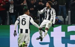 Weston McKennie (R) celebrates after scoring to give Juventus a 2-0 lead against Manchester City in Turin