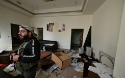 A ransacked office at the Syrian Defence Ministry's military security headquarters 