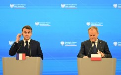 Macron was cutting short a day-long trip to Poland