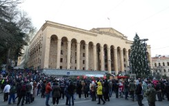 Demonstrators gathered outside parliament