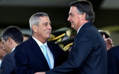 Brazilian general and former defence minister Walter Braga Netto (L), seen with far-right ex-president Jair Bolsonaro, has been arrested over an alleged coup plot, according to a police source