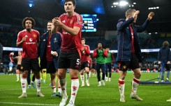 Defender Harry Maguire applauds fans after Manchester United's 2-1 win at the Etihad