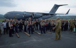 Rescue teams from Australia and New Zealand are joining the serach for survivors after an earthquake killed at least nine people in Vanuatu