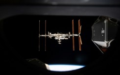 This handout image released by NASA on September 19, 2024 shows the International Space Station photographed from inside the SpaceX Crew Dragon Endeavour 