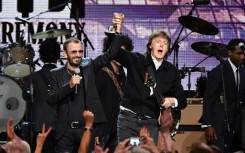 Paul McCartney (L) and Ringo Starr perform at the 2015 Rock And Roll Hall Of Fame Induction Ceremony