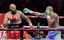 Ukraine's Oleksandr Usyk (blue trunks) gets the measure of Britain's Tyson Fury (red trunks) in Usyk's unanimous decision victory in their heavyweight world title fight at the Kingdom Arena in Riyadh