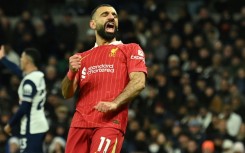 Liverpool's Mohamed Salah celebrates after scoring against Tottenham