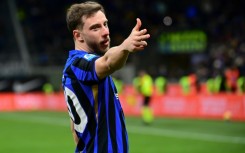 Carlos Augusto celebrates after scoring for Inter Milan in the win over Como