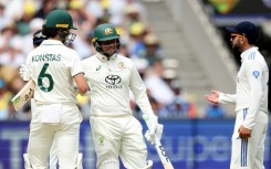 Australia's Sam Konstas (L) and India's Virat Kohli (R) bumped shoulders during the fourth Test in Melbourne