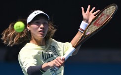 China's Zheng Qinwen hits a return during a practice session ahead of the Australian Open 